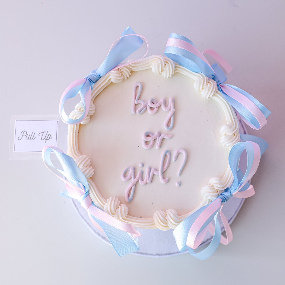 Gender Reveal Pull-Up Cake | dbakers Sweet Studio